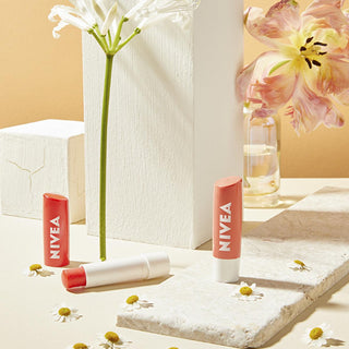 Nivea Lip Care Balm - 24 Hour Moisturizing Shimmering Lip Balm Nivea 24hr Moisturizing Lip Balm Lip balm, Nivea lip care, Moisturizing lip balm, Dermatologically tested lip care, Shimmering lip balm, Lip care products, Dry lip solution, Chapped lip remedy, Natural lip balm, Cleaner lip care