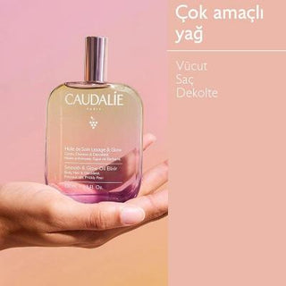 caudalie smoothening glow elixir oil 50ml, vegan skincare oil for body and hair Caudalie Smoothening Glow Elixir Oil | 50ml Caudalie Smoothening Glow Elixir Oil - 50ml caudalie, glow-elixir-oil, vegan-skincare, body-care, hair-care, smoothening-oil, radiant-skin, skincare-products, vegan-users, ai-generated