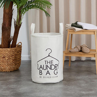 coco foldable felt laundry basket, white felt laundry basket with orange drawstring, foldable felt laundry basket in home setting Coco Foldable Felt Laundry Basket - Chic Design for Organizers | 14 in x 20 in Coco Foldable Felt Laundry Basket coco, foldable-basket, laundry-basket, felt-basket, home-organization, storage-solution, machine-washable, stylish-storage, toys-storage, ai-generated