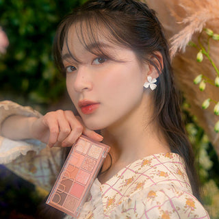 rom&nd Dreamy Lilac Garden Eyeshadow Palette: Create Stunning Eye Looks with Matte & Shimmer Shades, High Pigment Korean Eye Makeup rom&nd Dreamy Lilac Eyeshadow: Korean Palette, Matte & Shimmer rom&nd eyeshadow palette, Korean eyeshadow palette, matte shimmer eyeshadow, long lasting eyeshadow, eye makeup palette, Dreamy Lilac Garden eyeshadow, high pigment eyeshadow, blendable eyeshadow, eyeshadow, eye shadow, eye makeup, makeup, cosmetics, beauty, lilac eyeshadow, purple eyeshadow, Korean beauty, K-beauty