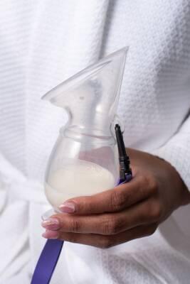 lansinoh silicone breast pump front view, lansinoh breast pump side view, lansinoh breast pump in use, lansinoh silicone breast pump packaging Lansinoh Silicone Breast Pump - Efficient Milk Collector | Portable Lansinoh Silicone Breast Pump - Efficient Milk Collector breast-pump, milk-collector, lansinoh, silicone-breast-pump, mothers, new-parents, portable-pump, baby-care, breastfeeding, ai-generated