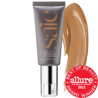 Saie Slip Tint - Lightweight Tinted Moisturizer with SPF 35, Hyaluronic Acid & Mineral Zinc Oxide for Dewy Coverage Saie Slip Tint: Tinted Moisturizer with SPF 35 & Hyaluronic Acid tinted moisturizer, SPF 35, non-comedogenic, mineral zinc oxide, hyaluronic acid, lightweight coverage, cruelty-free, gluten-free, recyclable packaging, dermatologist-tested, natural makeup, dewy finish, liquid formulation, clean beauty, sustainable beauty, sensitive skin friendly, fragrance-free