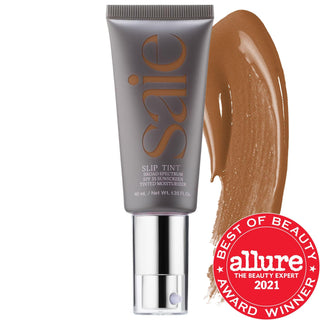 Saie Slip Tint - Lightweight Tinted Moisturizer with SPF 35, Hyaluronic Acid & Mineral Zinc for Natural Dewy Coverage Saie Slip Tint - Tinted Moisturizer SPF 35 tinted moisturizer, SPF 35, non-comedogenic, fragrance-free, dermatologist-tested, natural makeup, mineral sunscreen, hyaluronic acid skincare, Saie, Slip Tint, lightweight coverage, dewy finish, everyday makeup, sensitive skin friendly, skincare benefits, sun protection, clean beauty, cruelty-free, gluten-free