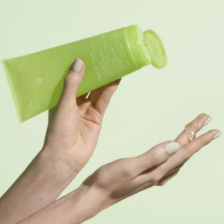 Caudalie Fleur De Vigne Shower Gel: Vegan, Soap-Free, Fragrant, Gentle Skin Cleanser - Watermelon & Rose Scent (6.76 fl oz) Caudalie Fleur De Vigne Shower Gel - Vegan & Fragrant shower gel, vegan shower gel, fragrant shower gel, Caudalie shower gel, Fleur De Vigne, gentle skin cleanser, soap-free shower gel, watermelon rose shower gel, vegan, soap-free, watermelon, pink pepper, white rose, aloe vera, hydrating, refreshing, sensitive skin, body wash, floral scent, fruity scent, cruelty-free, skincare, person