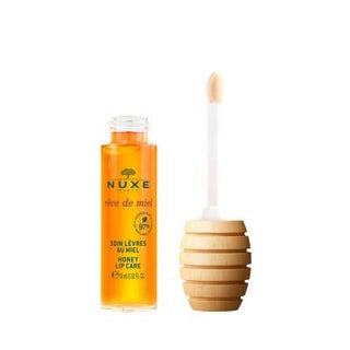 Nuxe Rêve De Miel Honey Lip Balm - Nourishing Dry Lip Treatment with Provence Honey & Camellia Oil Nuxe Honey Lip Balm - Hydrating Treatment for Dry, Chapped Lips honey lip balm, nourishing lip care, dry lip treatment, Nuxe lip balm, Provence honey lip balm, natural lip balm, hydrating lip ointment, lip care for dry lips, lip balm, dry lips, chapped lips, honey, Provence honey, camellia oil, hydrating, moisturizing, lip care, lip treatment, beauty, natural beauty, omega 3, omega 6, non-sticky, daily lip car