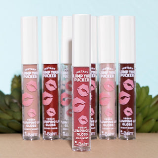 theBalm Instant Plump Your Pucker Lip Gloss: Volumizing, Hydrating, Non-Sticky Formula with Jojoba & Avocado Oil - Howdy Honey Shade theBalm Lip Plumper: Volumizing Gloss, Jojoba & Avocado Oil lip plumper, volumizing lip gloss, jojoba oil lip gloss, avocado oil lip gloss, non-sticky lip gloss, theBalm lip gloss, lip gloss Howdy Honey, natural lip plumper, plumping lip gloss, lip gloss, lip care, beauty, cosmetics, makeup, lip enhancement, lip volume, hydration, moisturizing lip gloss, non-sticky, comfortabl