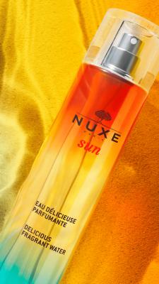 Nuxe Sun Eau Delicieuse Parfumante: Tropical Tiare & Vanilla - Natural Summer Perfume, Moisturizing Sun Scent Nuxe Sun Perfume: Tiare & Vanilla - Summer Fragrance Nuxe Sun Eau Delicieuse Parfumante, summer fragrance, natural perfume, bergamot tiare fragrance, moisturizing perfume, sun scent, tiare flower perfume, vanilla incense perfume, perfume, fragrance, bergamot, tiare flower, incense, vanilla, Tiaré flower oil, natural ingredients, summer scent, tropical scent, floral perfume, women's perfume, eau de p