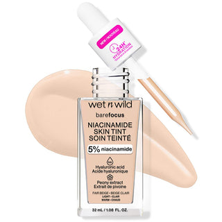 Wet n Wild Niacinamide Skin Tint Fondöten Fair Beige - product view, Wet n Wild Niacinamide Skin Tint Fondöten Fair Beige - swatch, Wet n Wild Niacinamide Skin Tint Fondöten Fair Beige - with packaging Wet n Wild Niacinamide Skin Tint Fondöten - Lightweight Formula for Natural Coverage | Fair Beige Wet n Wild Niacinamide Skin Tint - Fair Beige wet-n-wild, niacinamide-skin-tint, lightweight-foundation, fair-beige, makeup, beauty, cosmetics, skin-friendly, hydration, ai-generated