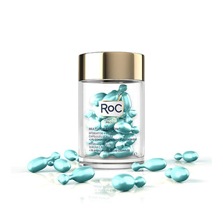 roc multi correxion serum capsules packaging, roc serum capsules opened with product inside, roc multi correxion serum capsules on a bathroom counter RoC Multi Correxion Hydrate + Plump Serum Capsules - 30 pcs RoC Multi Correxion Serum Capsules - Hydrate & Plump roc, multi-correxion, serum-capsules, hydrate, plump, anti-aging, skincare, moisturizer, hyaluronic-acid, ai-generated