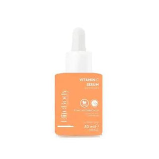 elitebody vitamin c serum bottle front, elitebody vitamin c serum on table, elitebody vitamin c serum application EliteBody Vitamin C Serum - Brightening & Nourishing | 30 ml EliteBody Vitamin C Serum - Brightening & Nourishing vitamin-c, skin-care, anti-aging, hydration, brightening-serum, nourishing-serum, sensitive-skin, elitebody, serum, ai-generated