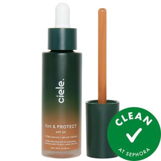 tint & PROTECT - Vegan Tinted Serum Foundation with SPF 50+ - Medium Coverage, Cruelty-Free & Gluten-Free tint & PROTECT - Vegan Tinted Serum Foundation SPF 50+ tinted serum foundation, SPF 50+ makeup, vegan cosmetics, non-comedogenic foundation, cruelty-free beauty products, gluten-free makeup, liquid foundation, medium coverage foundation, natural finish foundation, eco-friendly packaging, recyclable packaging, acne-safe foundation, skincare makeup, clean beauty products