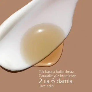 Caudalie Sunless Tanning Drops: Natural Bronzer with Hyaluronic Acid for Sunless Glow | Sensitive Skin Friendly Caudalie Sunless Tanning Drops - Natural Bronzer & Sunless Glow sunless tanning drops, natural bronzer, DHA self-tanner, hyaluronic acid tanning, paraben-free tanner, sensitive skin tanner, Caudalie tanning drops, self-tanning serum, sunless glow, natural self tanner, self tanner, tanning serum, natural tan, sunless tan, hyaluronic acid, grape water, natural ingredients, paraben free, silicone fre