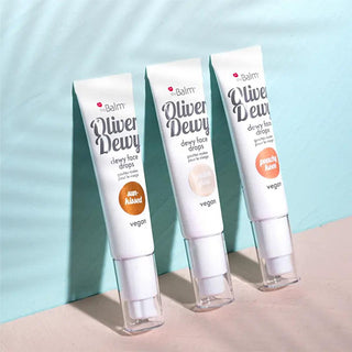 theBalm Oliver Dewy Face Drops: Achieve Radiant, Glowing Skin with this Illuminating Liquid Highlighter - Peachy Keen & Sun-Kissed Options theBalm Dewy Face Drops: Radiant Liquid Highlighter dewy face drops, liquid highlighter, theBalm highlighter, peachy keen highlighter, sun-kissed highlighter, golden glow highlighter, radiant glow makeup, illuminating face drops, highlighter, face illuminator, makeup, cosmetics, dewy finish, radiant skin, black currant oil, niacinamide, skincare, beauty, luminous skin, g
