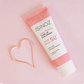 Sinoz SPF50+ Pink Touch Facial Sunscreen: Tone Up & Protect with High Protection, Calamine & PA++++ for Radiant Skin (1.69 fl oz) Sinoz SPF50+ Pink Sunscreen: Tone Up & High Protection SPF 50 sunscreen, pink tone up sunscreen, sunscreen for face, high protection sunscreen, sunscreen with calamine, tone correcting sunscreen, brightening sunscreen, Sinoz sunscreen, sunscreen for all skin types, facial sunscreen, sun protection, UVA/UVB protection, radiant skin, even skin tone, calamine, panthenol, shea butter
