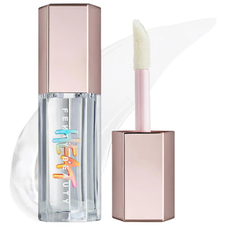 Fenty Beauty Gloss Bomb Heat: Lip Plumper & Luminizer for Fuller, High-Shine Lips | Cruelty-Free Lip Gloss Fenty Beauty Lip Plumper: Get Fuller Lips with High-Shine Gloss lip plumper, lip gloss, lip luminizer, fuller lips, high shine lip gloss, cruelty-free lip gloss, gloss bomb heat, lip plumping gloss, lip gloss, lip shine, plumping lip gloss, lip enhancer, moisturizing lip gloss, shea butter, vitamin E, high-shine finish, hint of tint, lip care, cruelty-free, gluten-free, beauty, cosmetics, makeup, lip m