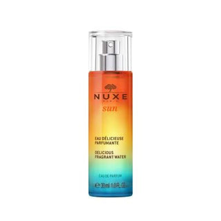 Nuxe Sun Eau Delicieuse Parfumante Body Spray - Tropical Summer Scent with Coconut & Tiare Flower | 30ml Nuxe Sun Body Spray: Tropical Coconut Summer Beach Scent Nuxe Sun fragrance, body spray, summer scent, tropical fragrance, coconut body mist, natural body spray, eau delicieuse parfumante, tiare flower perfume, sun inspired fragrance, beach scent, Nuxe, body mist, perfume, fragrance, tropical, coconut, tiare flower, natural, summer, beach, sweet orange, petitgrain, vanilla, musk, women's fragrance, light