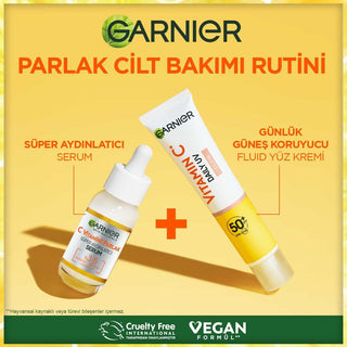 garnier c vitamin bright daily sunscreen fluid in 40ml, garnier sunscreen showing texture and packaging Garnier C Vitamin Bright Daily Sunscreen Fluid - SPF50 | 40ml Garnier C Vitamin Bright Daily Sunscreen SPF50 - 40ml garnier, c-vitamin, sunscreen, spf50, daily-skincare, skin-care, vegan, uv-protection, brightening, ai-generated