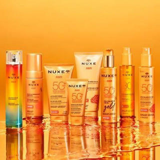 Nuxe Sun Eau Delicieuse Parfumante Body Spray - Tropical Summer Scent with Coconut & Tiare Flower | 30ml Nuxe Sun Body Spray: Tropical Coconut Summer Beach Scent Nuxe Sun fragrance, body spray, summer scent, tropical fragrance, coconut body mist, natural body spray, eau delicieuse parfumante, tiare flower perfume, sun inspired fragrance, beach scent, Nuxe, body mist, perfume, fragrance, tropical, coconut, tiare flower, natural, summer, beach, sweet orange, petitgrain, vanilla, musk, women's fragrance, light