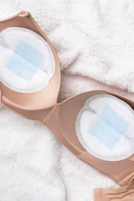 Lansinoh Breast Pads for Breastfeeding Mothers - Absorbent, Discreet, Comfortable - 100 Count Lansinoh Breast Pads - Absorbent & Discreet for Nursing Mothers breast pads, breastfeeding support, absorbent breast pads, discreet breast pads, BPA free baby products, Lansinoh, breastfeeding mothers, comfort, confidence, leak protection, soft, breathable, adhesive strips, individually wrapped, hygiene, safety, mother and baby products