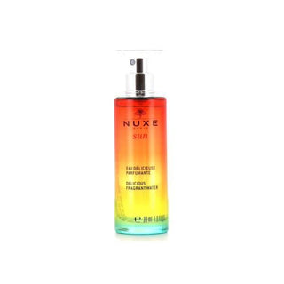 Nuxe Sun Delicious Fragrant Water: Refreshing Tropical Body Spray for Summer | 30ml Travel Size Nuxe Sun Fragrant Water - Tropical Body Spray | Summer Scent Nuxe Sun Fragrant Water, Body Spray, Summer fragrance, Floral body mist, Tropical scent, Light perfume, Refreshing body spray, Alcohol based fragrance, Fragrant water, Body mist, Floral Scent, Travel fragrance, summer, vacation, floral, tropical, alcohol based, Nuxe, Eichhornia crassipes extract, Fagraea berteroana flower extract, refreshing fragrance, 