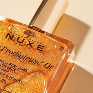 Nuxe Huile Prodigieuse Or: Golden Shimmer Dry Body & Hair Oil for Radiant Skin - Natural, Multi-Purpose, Paraben-Free, Hydrating - 100 ml Nuxe Golden Shimmer Oil: Radiant Skin & Hair Hydration Nuxe Huile Prodigieuse Or, Golden shimmer dry oil, Multi-purpose hair oil, Natural dry oil, Shimmer body oil, Hydrating hair oil, Paraben-free oil, Radiant skin oil, Golden glow oil, dry body oil, hair oil, shimmer oil, body oil, natural ingredients, paraben-free, vitamin E, moisturizer, radiant skin, glowing skin, hy