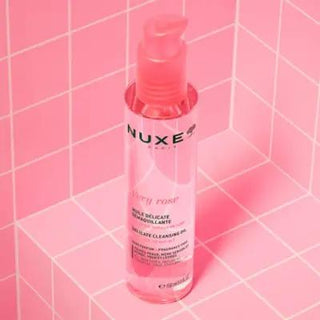 Nuxe Very Rose: Gentle Rose Cleansing Oil - Effectively Removes Makeup & Hydrates Sensitive Skin - Natural Oil Cleanser Nuxe Rose Cleansing Oil - Gentle Makeup Remover for Sensitive Skin cleansing oil, gentle cleanser, makeup remover, sensitive skin cleanser, rose cleansing oil, natural cleansing oil, hydrating cleansing oil, oil cleanser for sensitive skin, Nuxe cleansing oil, waterproof makeup remover, rose water, sweet almond oil, coconut oil, natural oils, oil-based formula, paraben-free, sulfate-free, 