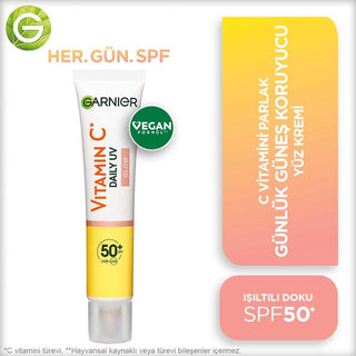 garnier c vitamin bright daily sunscreen fluid in 40ml, garnier sunscreen showing texture and packaging Garnier C Vitamin Bright Daily Sunscreen Fluid - SPF50 | 40ml Garnier C Vitamin Bright Daily Sunscreen SPF50 - 40ml garnier, c-vitamin, sunscreen, spf50, daily-skincare, skin-care, vegan, uv-protection, brightening, ai-generated
