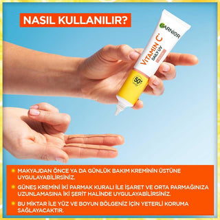 garnier c vitamin bright daily sunscreen fluid in 40ml, garnier sunscreen showing texture and packaging Garnier C Vitamin Bright Daily Sunscreen Fluid - SPF50 | 40ml Garnier C Vitamin Bright Daily Sunscreen SPF50 - 40ml garnier, c-vitamin, sunscreen, spf50, daily-skincare, skin-care, vegan, uv-protection, brightening, ai-generated