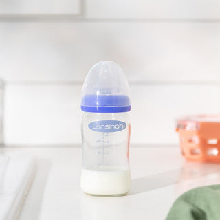 lansinoh glass bottle with naturalwave nipple 160ml, naturalwave nipple design for smoother feeding, anti-colic air vent system illustration Lansinoh Glass Bottle with NaturalWave Nipple - Perfect for New Parents | 160ml Lansinoh Glass Bottle with NaturalWave Nipple - 160ml lansinoh, glass-bottle, baby-feeding, naturalwave-nipple, anti-colic, new-parents, parents, expectant-mothers, bottle-feeding, ai-generated