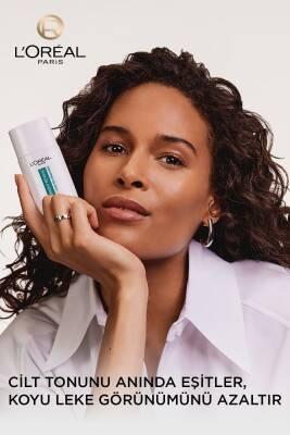 L'Oreal Paris Bright Reveal Tinted Sunscreen Fluid SPF 50 - Dark Spot Corrector, Evens Skin Tone, Medium Tint, Daily Sun Protection L'Oreal Tinted Sunscreen SPF 50: Dark Spot Corrector & Protection tinted sunscreen, SPF 50 sunscreen, dark spot corrector, skin brightening sunscreen, sunscreen with niacinamide, medium tinted sunscreen, Loreal sunscreen, sun protection for dark spots, daily sunscreen fluid, sunscreen, SPF 50, dark spot treatment, skin brightening, niacinamide, medium tint, sun protection, dail