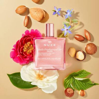 Nuxe Huile Prodigieuse Florale Or: Multi-Purpose Shimmering Dry Oil for Radiant Skin & Hair - Natural Glow, Floral Scent, Lightweight Formula, 1.69 fl oz Nuxe Shimmering Dry Oil - Radiant Skin, Floral Scent | Multi-Purpose shimmering dry oil, multi-purpose oil, floral body oil, radiant skin oil, natural glow oil, Nuxe Huile Prodigieuse Florale Or, pink gold shimmer oil, tsubaki oil skincare, argan oil hair treatment, body oil, hair oil, face oil, shimmering oil, floral scent, natural ingredients, lightweigh