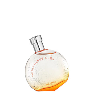 HERMÈS Eau des Merveilles Perfume for Women - Earthy & Woody Luxury Fragrance with Unique Magnifying Glass Bottle HERMÈS Eau des Merveilles Perfume - Earthy & Woody Luxury Fragrance Eau des Merveilles perfume, HERMÈS fragrance, Earthy and Woody perfume, Luxury perfume for women, Unique fragrance packaging, Perfume for women, Earthy fragrance, Woody scent, Luxury perfume, HERMÈS Eau des Merveilles, Fragrance for special occasions, Women's perfume, High-end fragrance, Distinctive perfume bottle