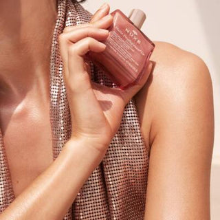 Nuxe Huile Prodigieuse Florale Or: Multi-Purpose Shimmering Dry Oil for Radiant Skin & Hair - Natural Glow, Floral Scent, Lightweight Formula, 1.69 fl oz Nuxe Shimmering Dry Oil - Radiant Skin, Floral Scent | Multi-Purpose shimmering dry oil, multi-purpose oil, floral body oil, radiant skin oil, natural glow oil, Nuxe Huile Prodigieuse Florale Or, pink gold shimmer oil, tsubaki oil skincare, argan oil hair treatment, body oil, hair oil, face oil, shimmering oil, floral scent, natural ingredients, lightweigh