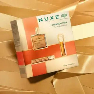 Nuxe Infinite Glow: Skincare Gift Set - Hydrating Dry Oil, Lip Balm & Radiance Enhancer | Nuxe Huile Prodigieuse & Reve de Miel Included Nuxe Gift Set: Radiant Skin w/ Huile Prodigieuse & Lip Balm Nuxe gift set, skincare gift set, beauty gift set, dry oil skincare, lip balm, radiance enhancing skincare, Nuxe Huile Prodigieuse, Nuxe Reve de Miel, moisturizing skincare set, gift set for women, dry oil, skincare, beauty, moisturizing, radiance, lip care, gift for her, gift for women, skincare routine, Nuxe ski