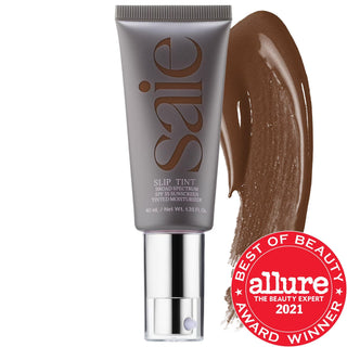 Saie Slip Tint - Lightweight Tinted Moisturizer with Mineral Zinc SPF 35, Hyaluronic Acid & Licorice Root Extract Saie Slip Tint - Tinted Moisturizer with SPF 35 & Hyaluronic Acid tinted moisturizer, mineral zinc oxide SPF 35, hyaluronic acid skincare, non-comedogenic makeup, gluten-free cosmetics, cruelty-free beauty products, Saie, Slip Tint, lightweight makeup, natural coverage, dewy finish, skincare-infused makeup, sensitive skin friendly, acne-prone skin, radiant complexion, broad-spectrum protection, 