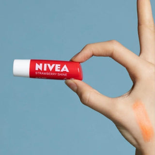 Nivea Nourishing Lip Care Balm with 24-hour Moisturization - Mineral Oil-Free Lip Balm Nivea 24-Hour Moisturizing Lip Balm - Mineral Oil-Free lip balm, nourishing lip care, 24-hour moisturization, dermatologically tested lip balm, mineral oil-free lip care, lip moisturizer, natural lip balm, shine lip balm, everyday lip care, healthy lip appearance, Nivea lip care