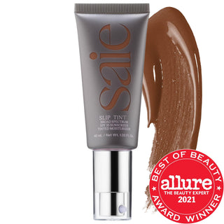 Saie Slip Tint - Lightweight Tinted Moisturizer with Mineral Zinc SPF 35 & Hyaluronic Acid for Radiant, Natural Coverage Saie Slip Tint - Tinted Moisturizer with SPF 35 & Hyaluronic Acid tinted moisturizer, mineral zinc oxide SPF 35, hyaluronic acid skincare, gluten-free cosmetics, cruelty-free beauty products, non-comedogenic makeup, fragrance-free skincare, recyclable packaging cosmetics, natural makeup, skincare benefits, sun protection, sheer coverage, radiant finish, everyday wear, beauty routine, cons