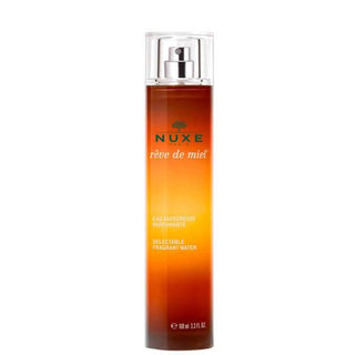 Nuxe Reve De Miel Body Spray: 100ml Natural Fragrance for a Refreshing Scent with Limonene & Linalool Notes Nuxe Reve De Miel Body Spray - Natural Refreshing Fragrance Nuxe Reve De Miel, body spray, natural fragrance, Eau Savoureuse Parfumante, fragrant body spray, 100ml body spray, limonene fragrance, linalool fragrance, Nuxe body spray, refreshing body spray, floral fragrance, citrus fragrance, women's fragrance, body mist, natural scent, perfume, body care, cosmetic spray, fine mist, everyday fragrance, 