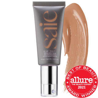 Saie Slip Tint - Lightweight Tinted Moisturizer with Mineral Zinc SPF 35 & Hyaluronic Acid for Dewy Coverage Saie Slip Tint - Tinted Moisturizer with SPF 35 & Hyaluronic Acid tinted moisturizer, mineral zinc oxide SPF 35, hyaluronic acid skincare, non-comedogenic makeup, cruelty-free beauty products, gluten-free cosmetics, natural makeup, dewy finish, lightweight coverage, sensitive skin friendly, fragrance-free, recyclable packaging, skincare benefits, sun protection, everyday makeup, beauty essentials