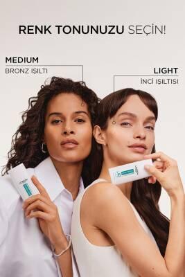 L'Oreal Paris Bright Reveal Tinted Sunscreen Fluid SPF 50 - Dark Spot Corrector, Evens Skin Tone, Medium Tint, Daily Sun Protection L'Oreal Tinted Sunscreen SPF 50: Dark Spot Corrector & Protection tinted sunscreen, SPF 50 sunscreen, dark spot corrector, skin brightening sunscreen, sunscreen with niacinamide, medium tinted sunscreen, Loreal sunscreen, sun protection for dark spots, daily sunscreen fluid, sunscreen, SPF 50, dark spot treatment, skin brightening, niacinamide, medium tint, sun protection, dail