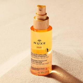 Nuxe Sun: UV Protection Moisturizing Hair Oil - Water Resistant Beach & Summer Hair Care, Protects from Sun, Salt & Chlorine - 3.38 fl oz Nuxe Sun Hair Oil - UV Protection, Moisturizing for Beach & Summer hair oil, sun protection hair, moisturizing hair oil, UV protection hair spray, water resistant hair protection, beach hair protection, summer hair care, Nuxe Sun hair oil, hair sunscreen, chlorine protection hair, hair care, UV protection, moisturizing, water-resistant, lightweight, summer fragrance, dual