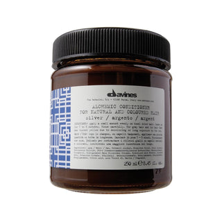 Davines Alchemic Silver Hair Cream 250ml - Professional Toned Hair Care for Colored Hair Davines Alchemic Silver Hair Cream 250ml Davines Alchemic Silver, Hair cream, Silver hair care, Purple shampoo or conditioner, Toned hair care products, Professional hair care, Colored hair care, Hair nourishment, Toning shampoo, Purple toning hair care, Hair conditioning, Premium hair products, Hair color maintenance